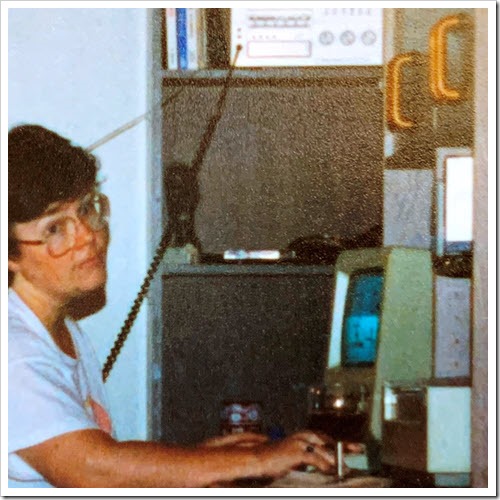 Debra in basement office working on Apple Macintosh, mid 1980s